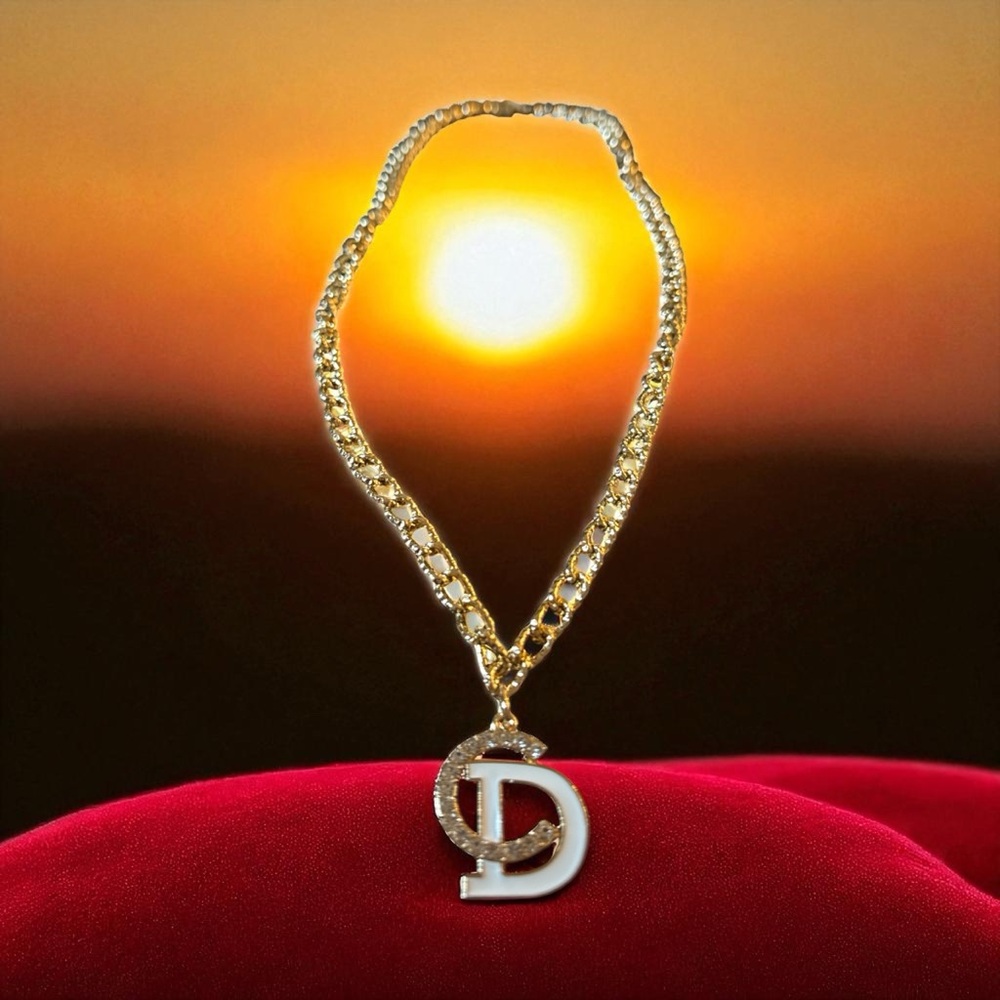 Dior Zipper Pull with gold tone chain